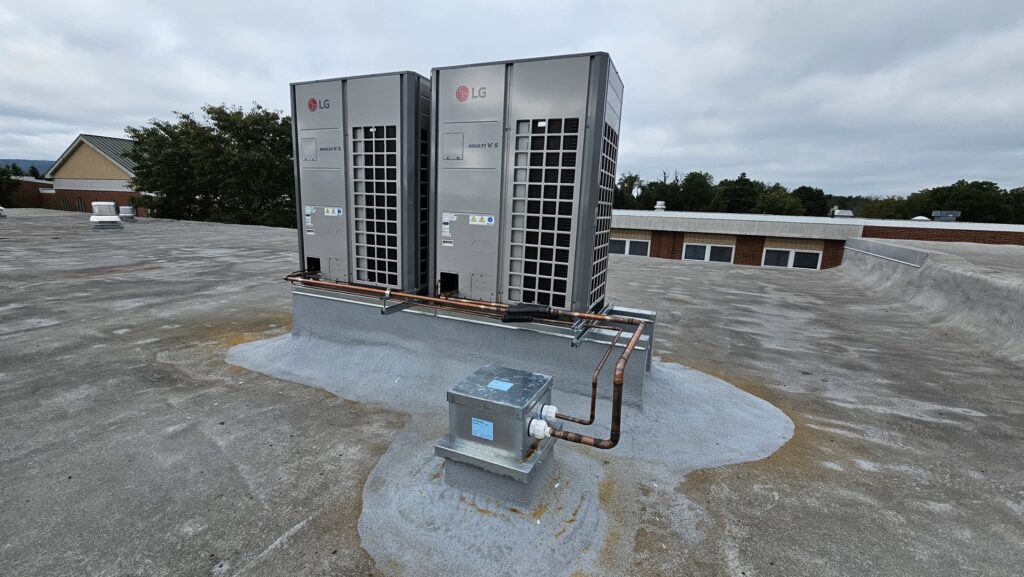Rooftop LG HVAC units installed on a commercial building by Clean Air Quality Service Inc in Hawthorne, NY