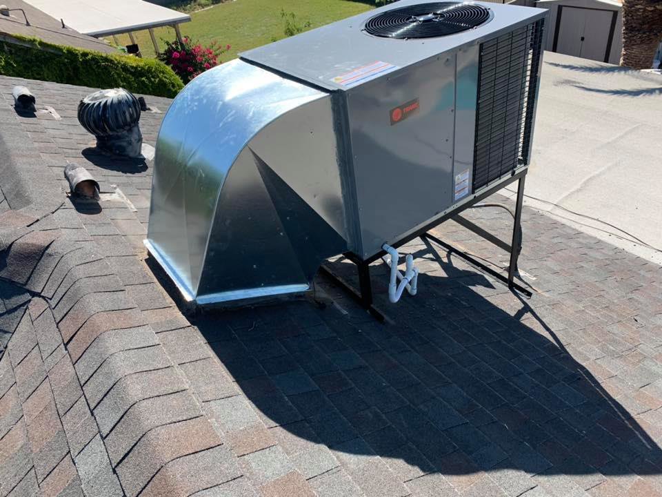A newly installed rooftop package HVAC unit with connected ductwork by Arizaz Heating & Cooling in Chandler, AZ.