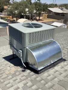 A rooftop package HVAC unit newly installed on a residential roof by Valle Del Sol Home Services, LLC in Scottsdale, AZ.