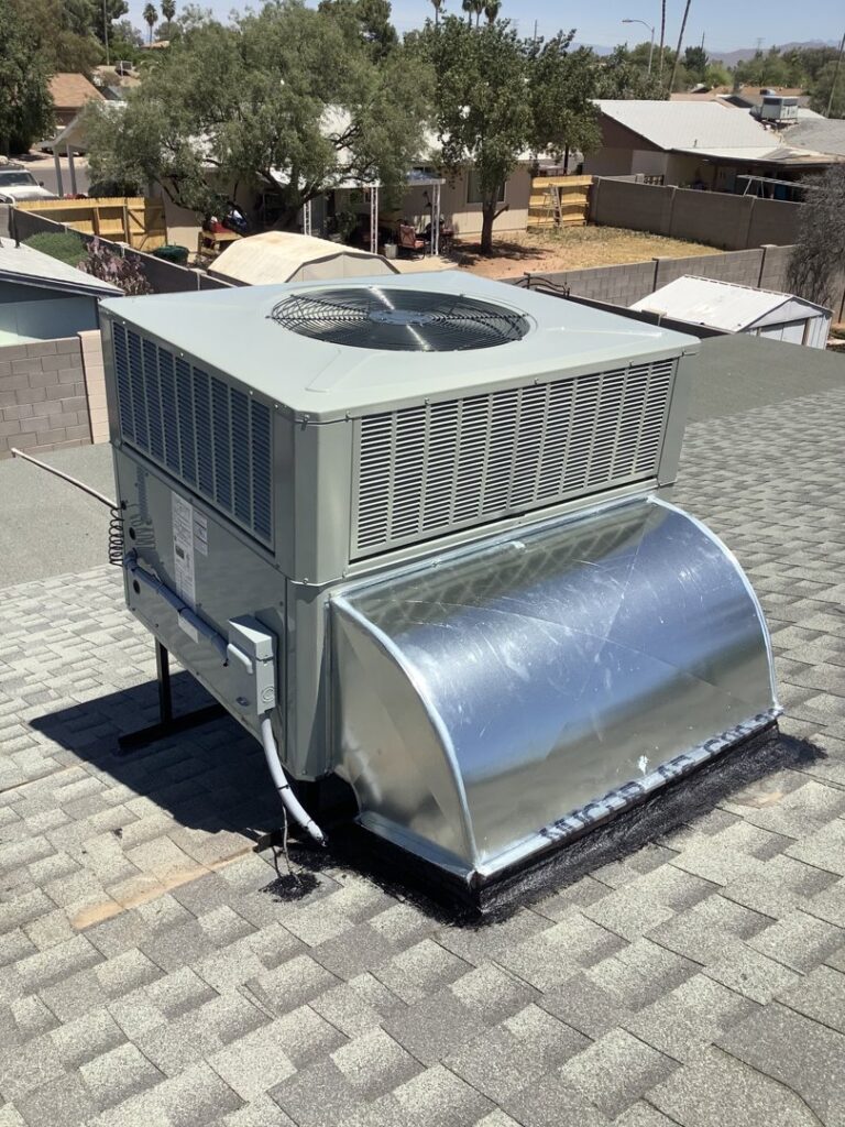 A rooftop package HVAC unit newly installed on a residential roof by Valle Del Sol Home Services, LLC in Scottsdale, AZ.