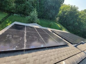 Rooftop solar panel installation on a residential home by Three Rivers Electric in Fort Wayne, IN.