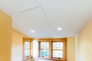 An interior room featuring efficient ceiling radiant heating and cooling panels installed by Mighty Energy Solutions in Seattle, WA.