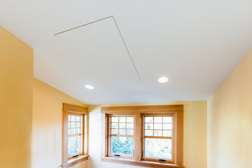 An interior room featuring efficient ceiling radiant heating and cooling panels installed by Mighty Energy Solutions in Seattle, WA.