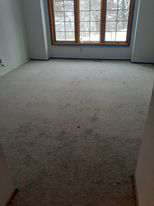 A room with newly installed light-colored carpet by Blue Star Flooring in Euless, TX