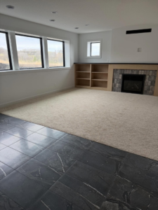A newly installed light-colored carpet in a modern room by DeGeus Tile and CarpetsPlus in Rochester, MN