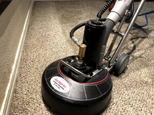 A rotary carpet cleaning machine in operation by Allen Rapid Dry Carpet Cleaning in Anchorage, AK.