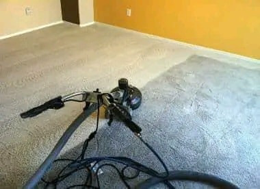 A rotary carpet cleaning machine in action on a residential carpet by Fusioncarpetcleaning in Fort Walton Beach, FL