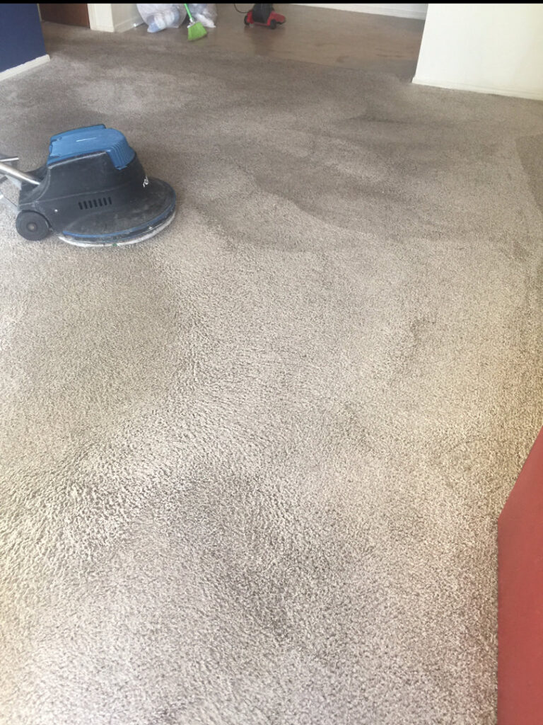 A rotary carpet cleaning machine in use, cleaning a carpet for Martin Pro Cleaner in Tulsa, OK