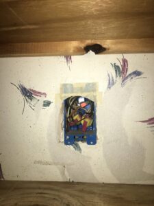 Rough-in electrical wiring installation in a wall box by Electrician Near Me in Broken Arrow, OK.
