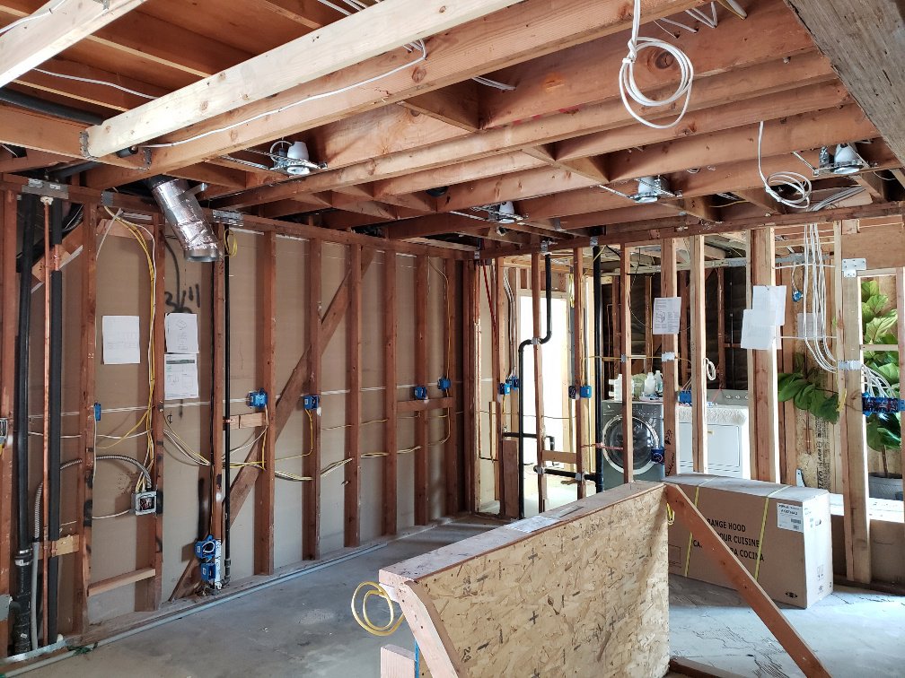 Rough-in electrical wiring and junction boxes installed in a residential construction project by Smith Electrical Contractors, Inc. in El Cajon, CA.
