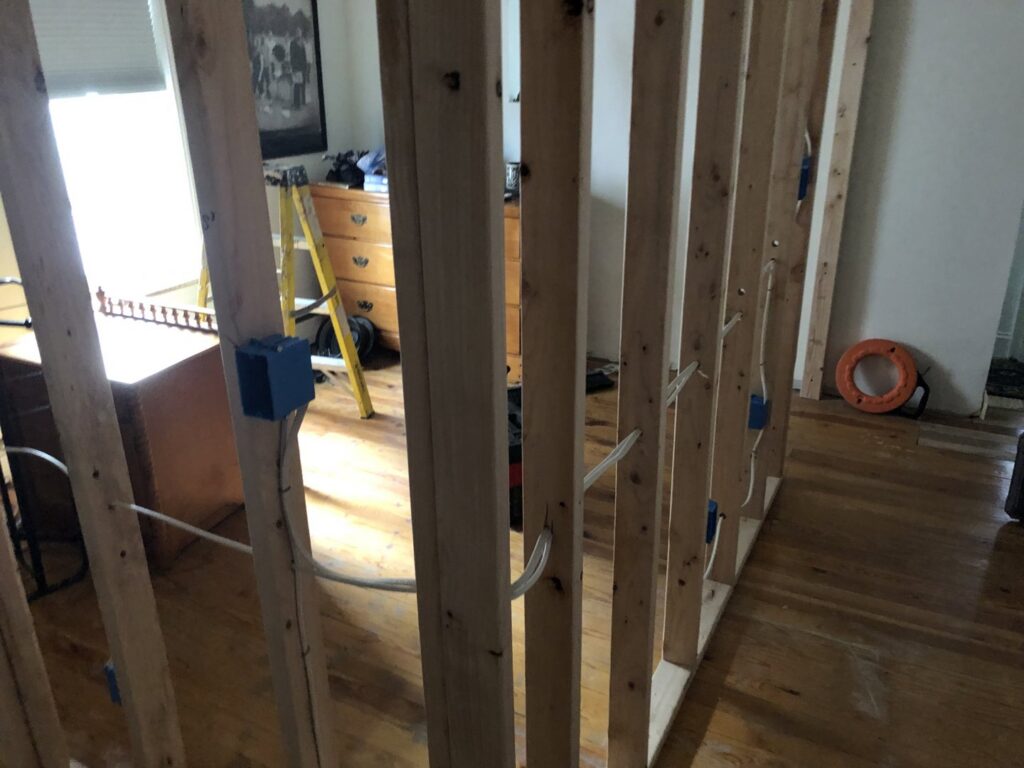 Rough-in electrical wiring and junction boxes installed in wall framing by The Dorky Electrician, LLC in Coplay, PA