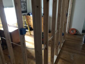 Rough-in electrical wiring and junction boxes installed in wall framing by The Dorky Electrician, LLC in Coplay, PA