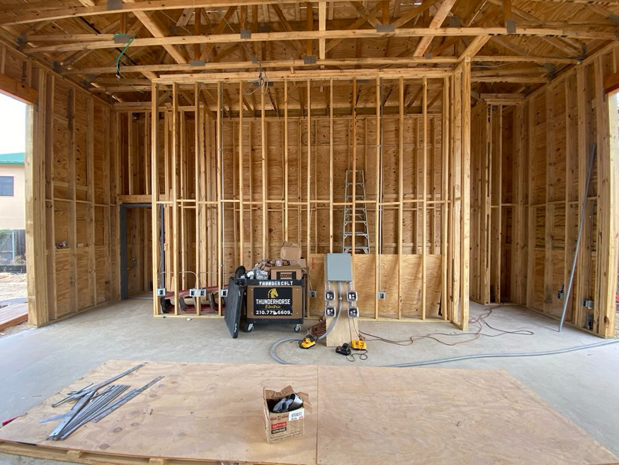 Rough-in electrical wiring and conduit installation inside a new construction building by Thundercolt Electric in San Antonio, TX.