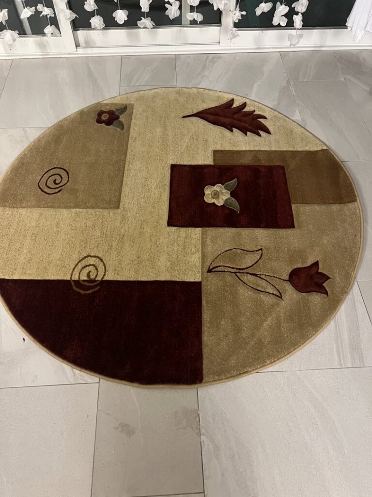 Round area rug with floral and leaf patterns, cleaned by PROlific Cleaning Services LLC in Indianapolis, IN.