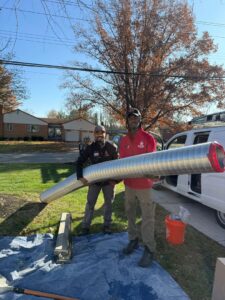 Royal Chimney's crew preparing a new chimney liner for installation in Blue Ash, OH.