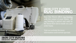 A close-up of a sewing machine performing rug binding services at Iron City Floors in Pelham, AL.