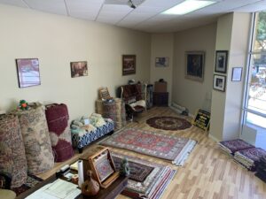 Interior view of the rug showroom displaying various area rugs at Mussallem Area Rug Specialist in Jacksonville, FL.
