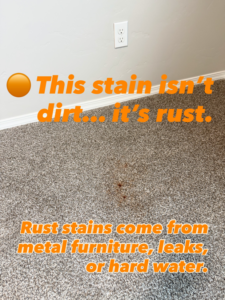 A close-up view of a rust stain on a carpet, indicating a common issue addressed by Bullseye Carpet & Upholstery Cleaning in Boise, ID.