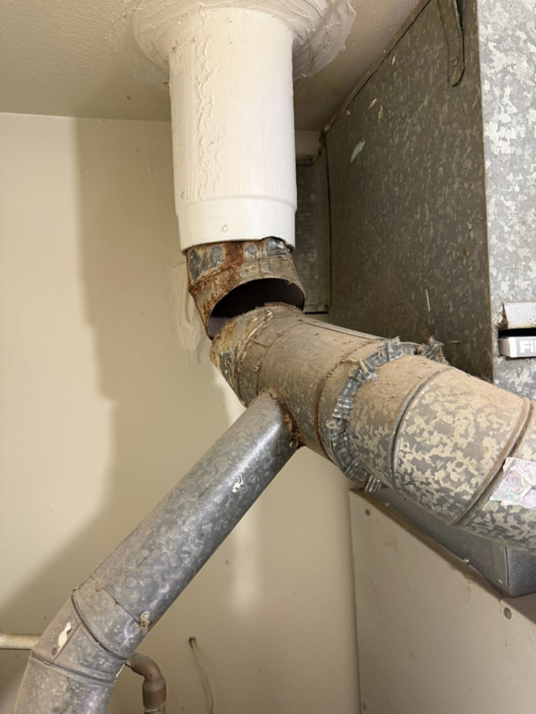 Close-up of rusty HVAC ductwork needing repair by Central Comfort Air in Miami, FL
