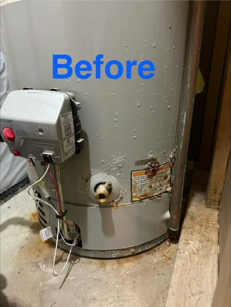 A rusty and leaking water heater before service by American Air LLC in Moncks Corner, SC