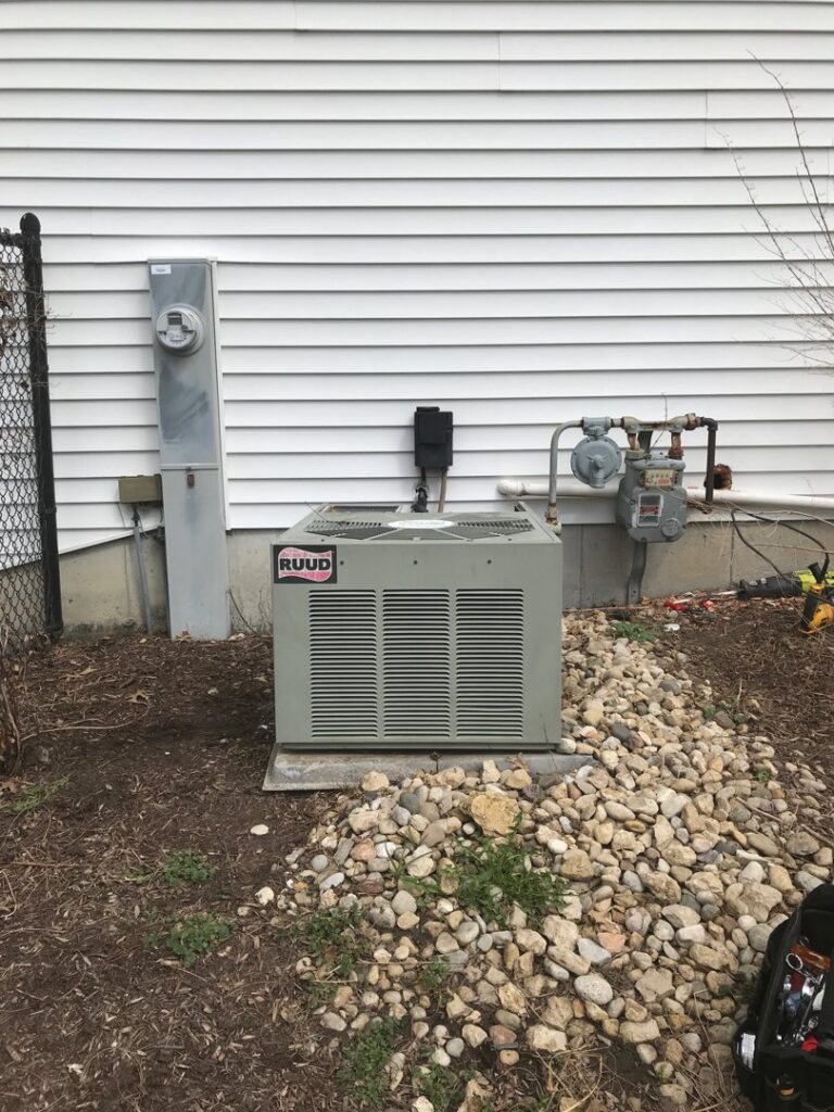 A Ruud outdoor AC unit installed by Wight's Heating & Air Conditioning in Rockford, IL