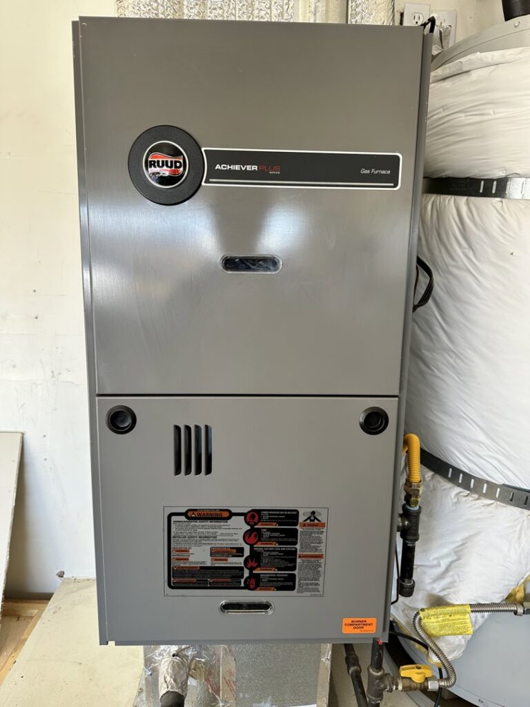 A Ruud Achiever Plus gas furnace installed by Paul's Heating & Air Conditioning in Virginia Beach, VA.