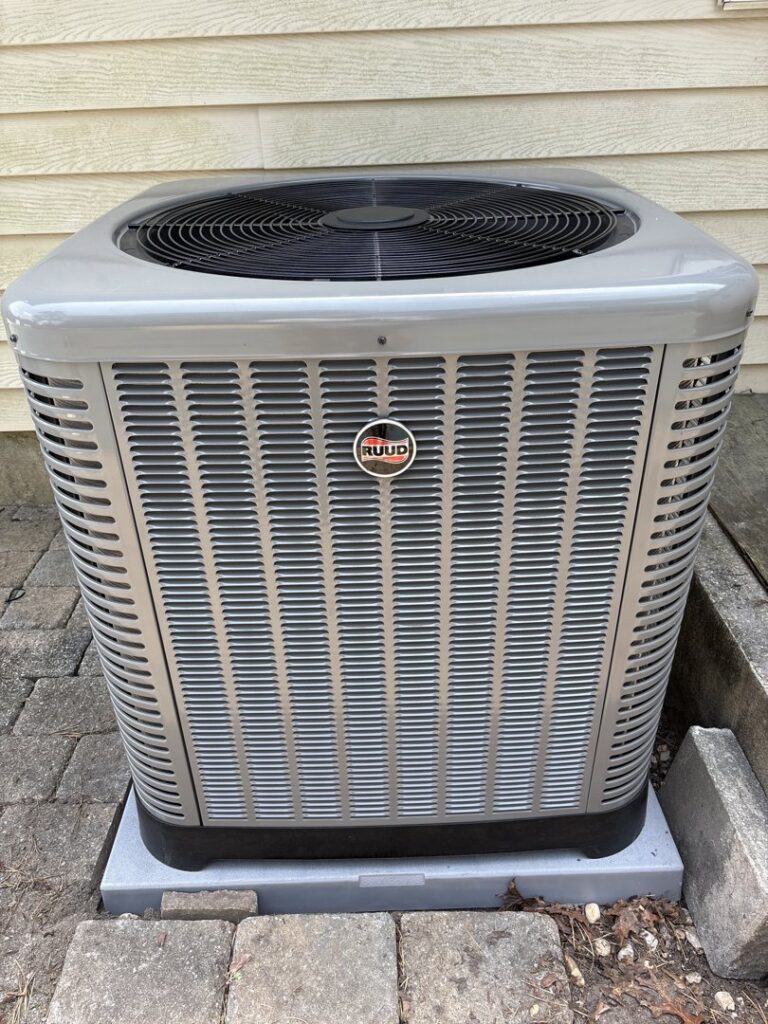 A new Ruud outdoor air conditioning unit installed by Accurate Conditioning in Sayreville, NJ.
