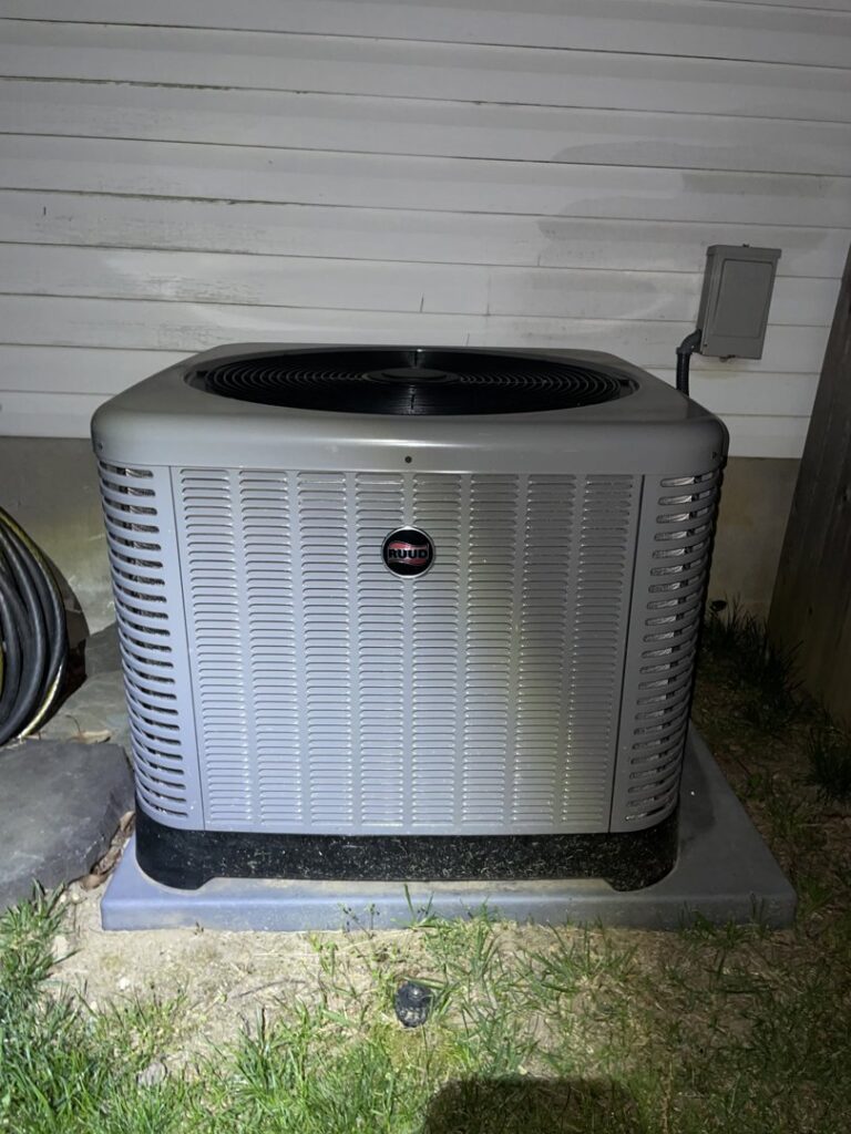 A RUUD brand residential air conditioning unit installed by Accurate HVAC in Vacaville, CA.