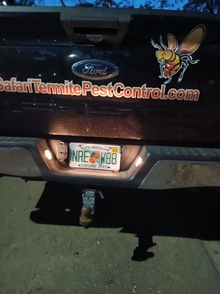 The back of a Safari Termite and Pest Control service truck with branding, indicating work in Jacksonville, FL.