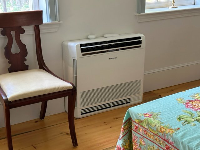 A Samsung floor-standing mini-split indoor unit installed in a room by Excel Mechanical and Construction LLC in Brunswick, ME