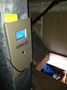A Sanuvox R+ air purification system installed on ductwork by Richmond Restoration in Worcester, MA
