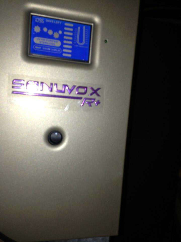 A close-up of a Sanuvox R+ air purification system control panel installed by Richmond Restoration in Worcester, MA