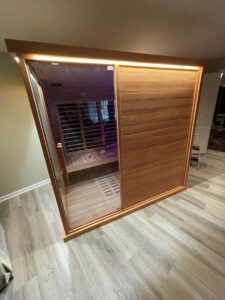 Interior lighting installation in a modern wooden sauna by Armenergo Electrician in Rockville, MD