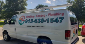 A Capes Whole Homes Heating & Air Conditioning service van with company branding and phone number in Olathe, KS.