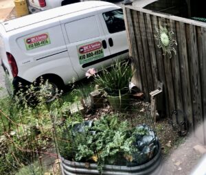 A service van for RPC & Services LLC parked at a client's property for wildlife and pest control services in Baltimore, MD.