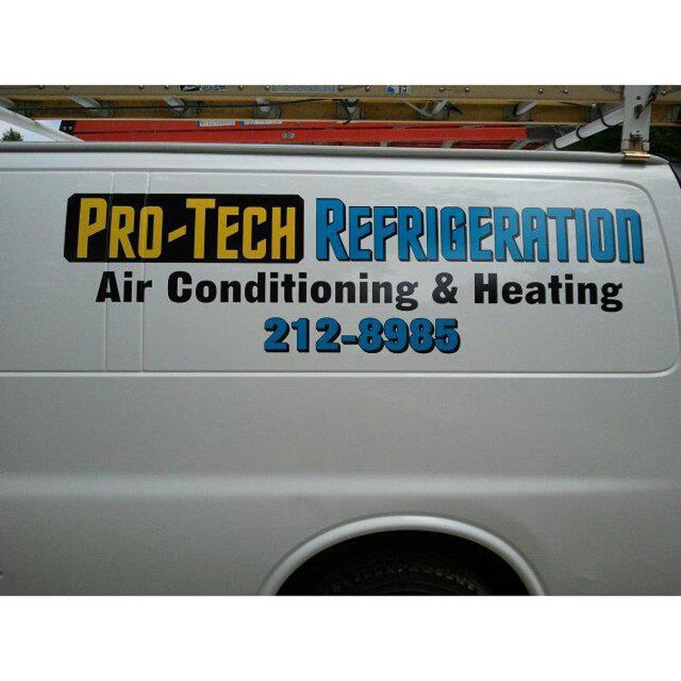 A Pro-Tech Refrigeration service van with business branding in Auburn, ME.