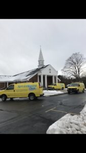 ServiceMaster Clean vans parked outside a church for commercial carpet cleaning services by ServiceMaster Albino in Waterbury, CT.