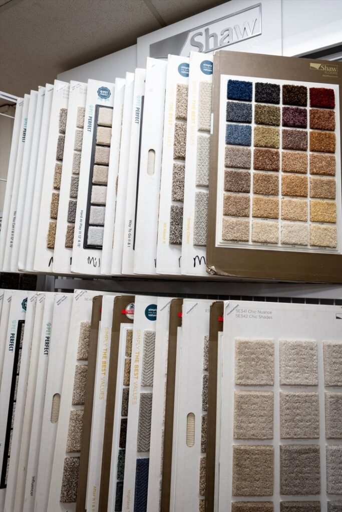 A showroom display featuring a wide variety of Shaw carpet samples at Mill Sales Co. in Los Angeles, CA