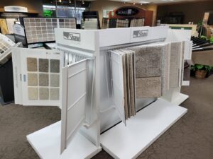 A Shaw Floors carpet sample display featuring a variety of colors and textures at Southwest Floors in Seven Hills, OH.