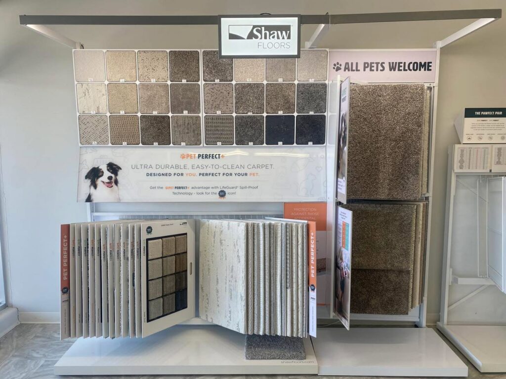 A Shaw Floors Pet Perfect carpet display with various samples at Beverly Hills Carpet & Tile in Huntington, WV.