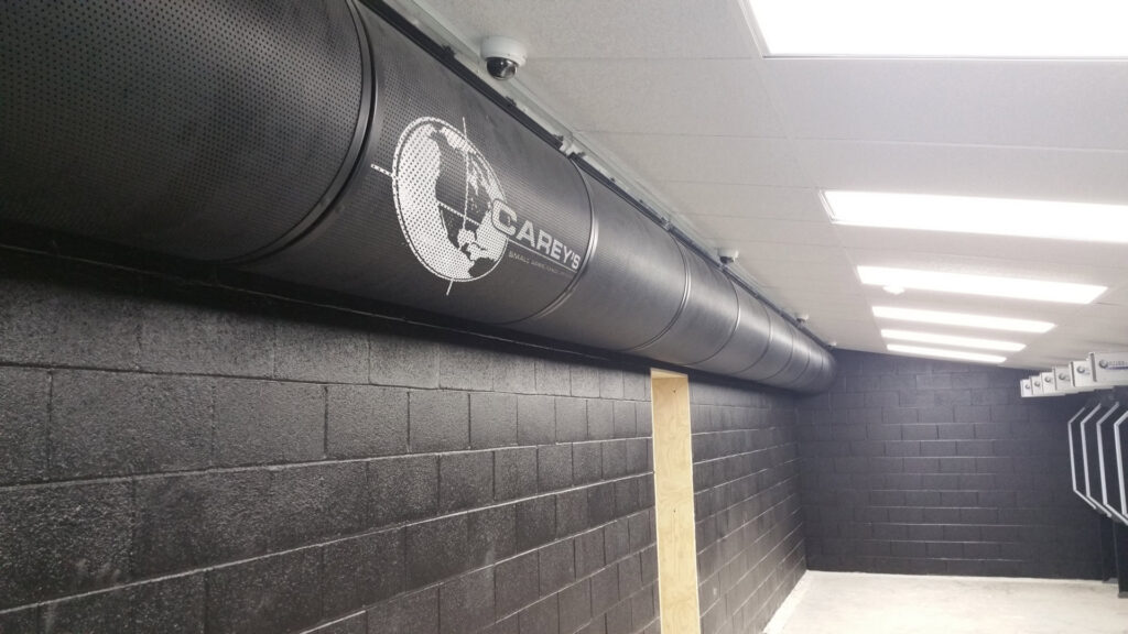 A long black ventilation duct system installed in a shooting range by Carey's Small Arms Range Ventilation in Tinley Park, IL.