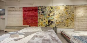 A wide view of the Organic Looms showroom interior, showcasing a variety of rugs and carpets in Scottsdale, AZ