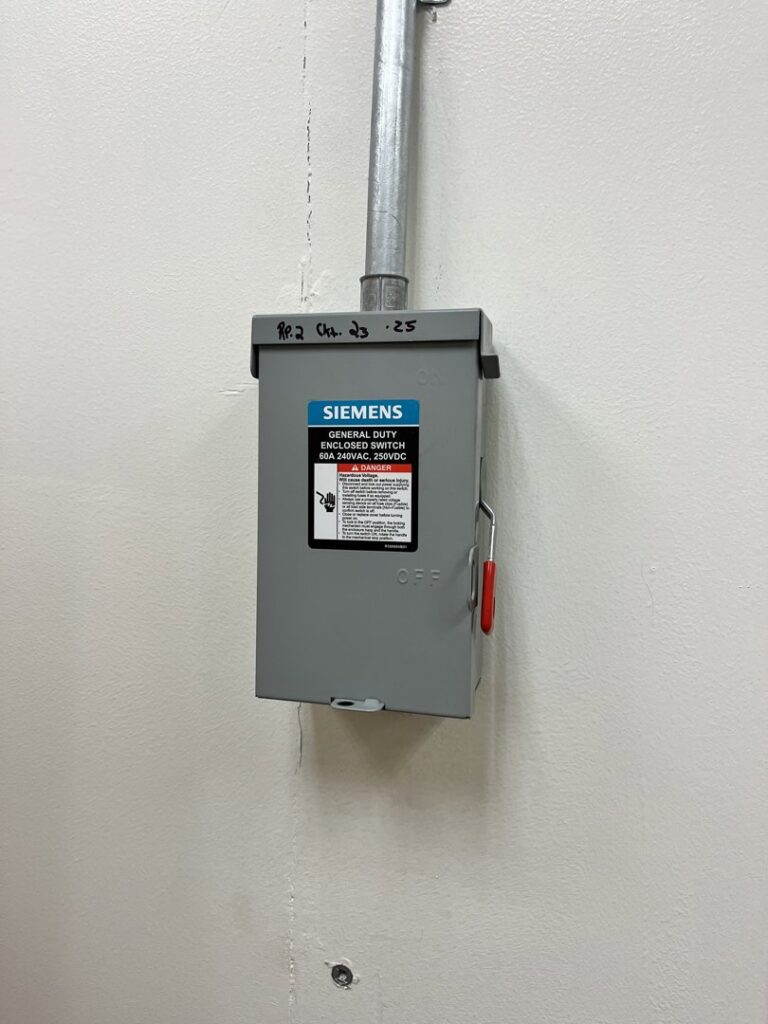 A Siemens general duty safety switch installed on a wall with conduit by E & E Electric in Post Falls, ID.