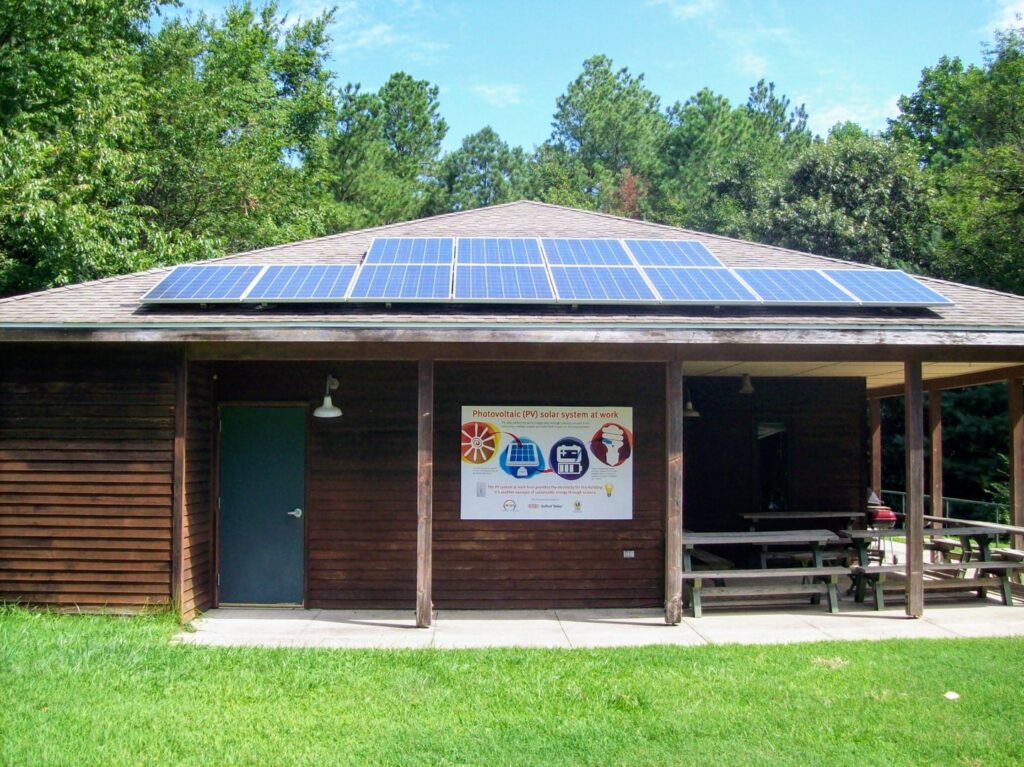 Solar panel installation on a small building by CMI Solar & Electric, Inc. in Newark, DE.