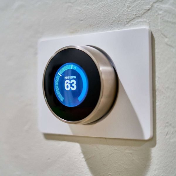 A modern smart thermostat installed by Chill Out Heating and Cooling in Tulsa, OK.