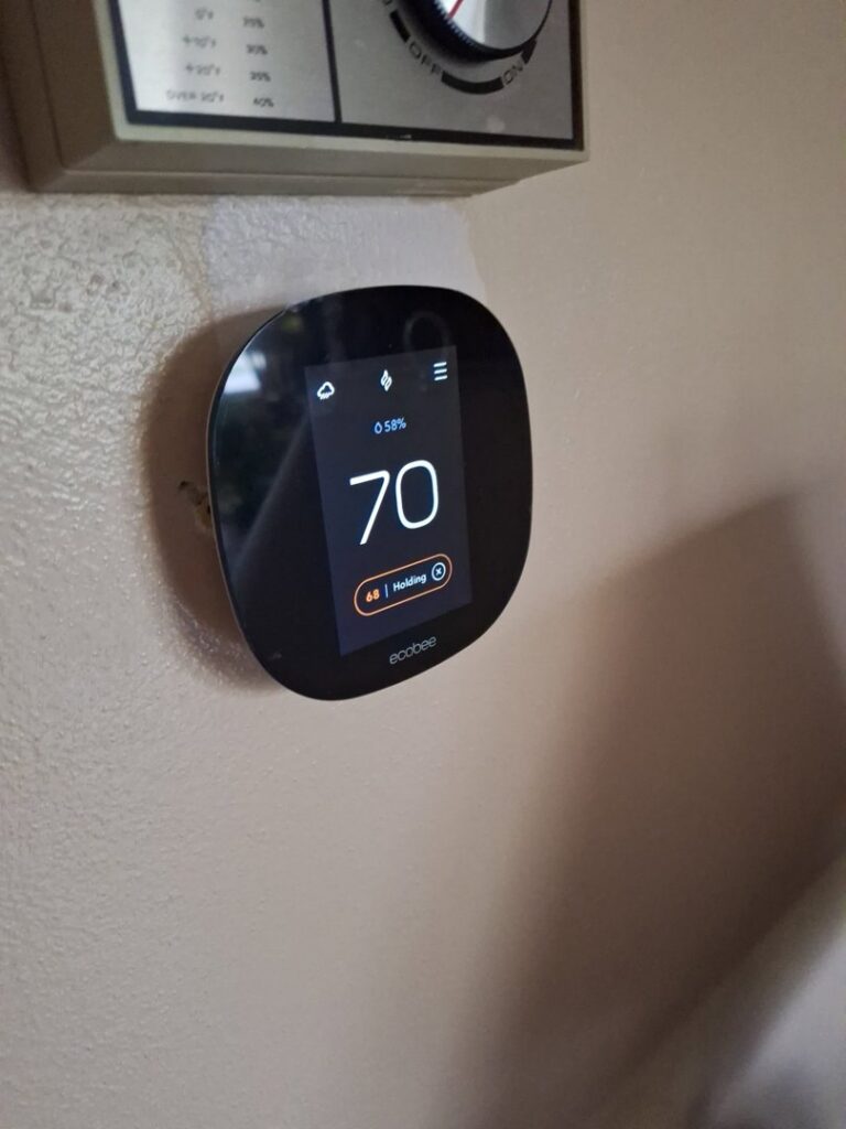 An Ecobee smart thermostat installed on a wall by Nimmer Heating & Air Conditioning in Milwaukee, WI