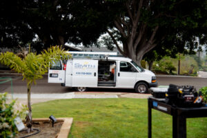The Smith Electrical Contractors, Inc. service van with its side door open, revealing tools and equipment in El Cajon, CA.