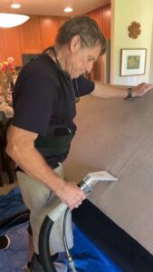 Sofa upholstery cleaning in progress by Arise Carpet Cleaning in Kailua, HI.