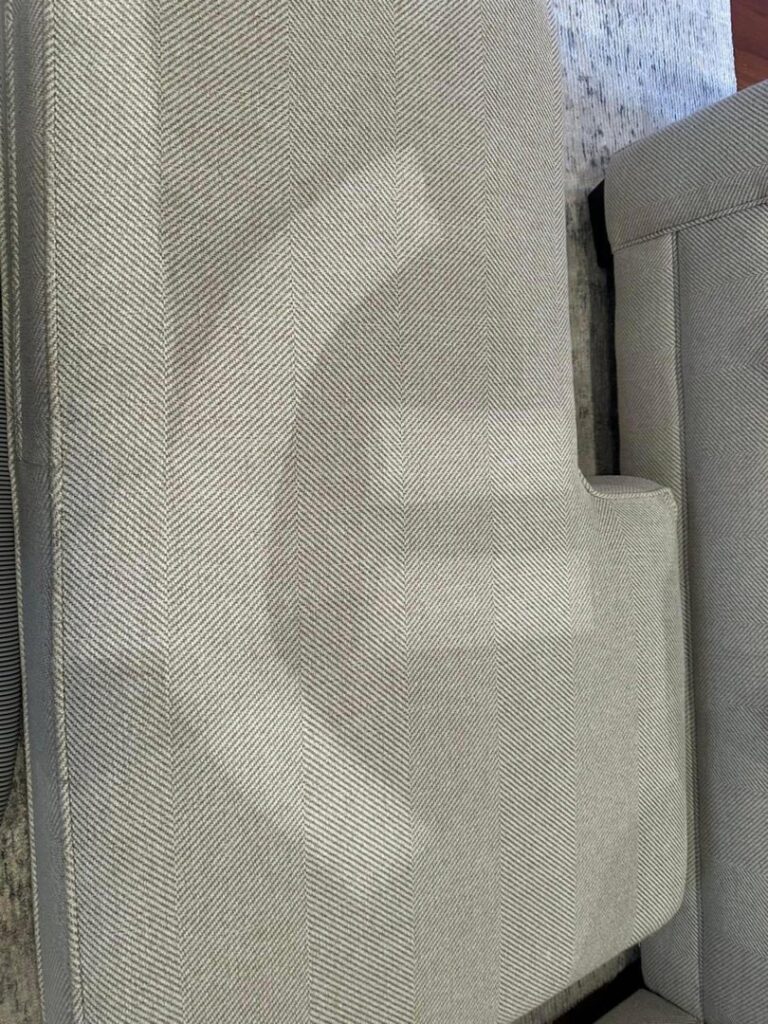 Professional sofa upholstery cleaning in progress by Carpet Chemistry, offering services in Gulfport, MS.