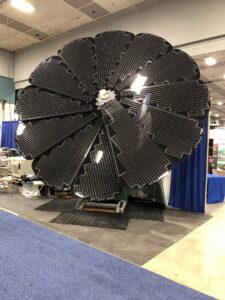 A large, circular solar panel array installed by Bonham Electric, Inc. in Sacramento, CA.